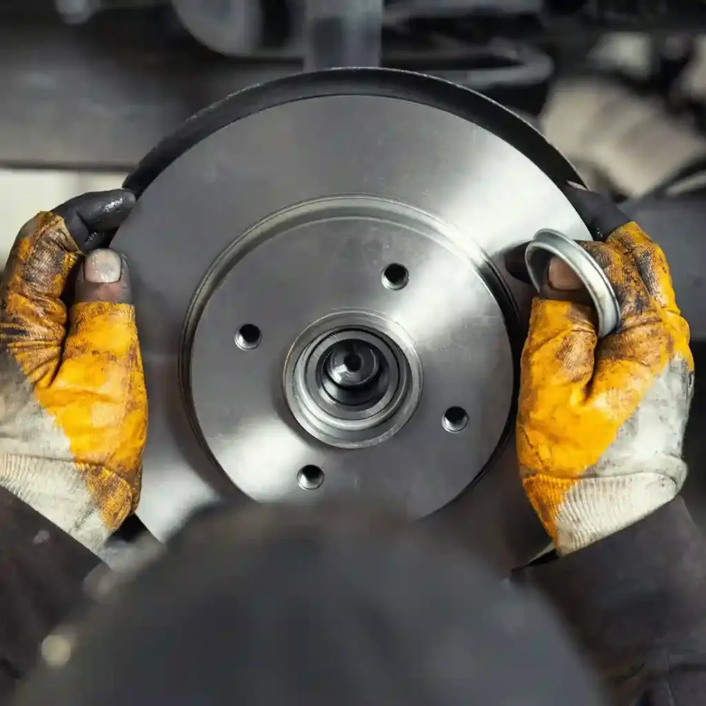 t autocare takedown mechanic replacing brake rotor in broken arrow