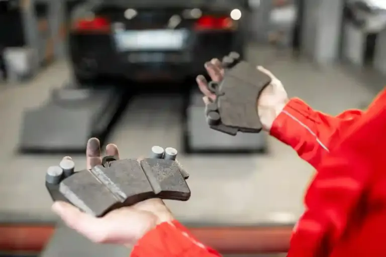 Holding brake pads at the car service